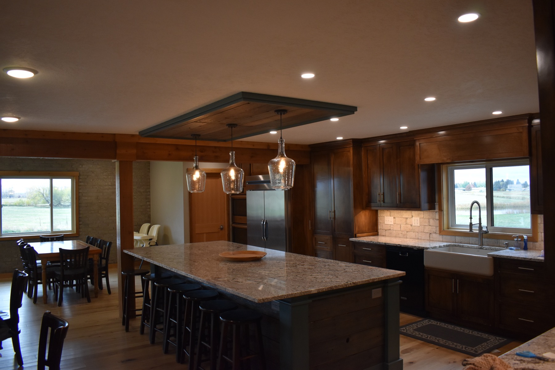 Commercial kitchen and dining area at Three Peaks Lodge